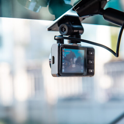 Dash camera attached to the windshield