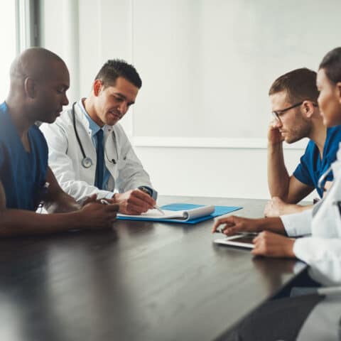 Image of doctors speaking after a birth injury