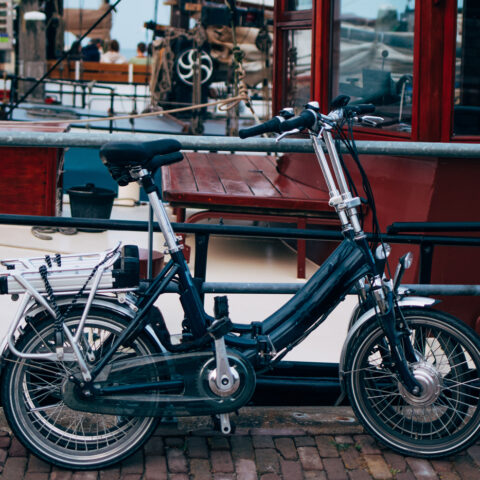 Photo of Electric Bike Against Rail